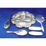 A SILVER DRESSING TABLE SET,