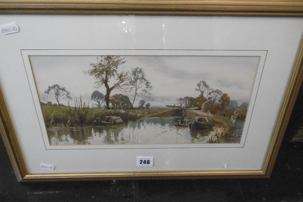 A SIGNED AND DATED RIVER SCENE WATERCOLOUR DATED 1904