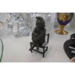 BRONZE FIGURE OF A GIRL ON STOOL