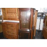 A MAHOGANY CORNER CUPBOARD