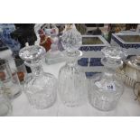 THREE GLASS DECANTERS