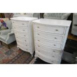 A PAIR OF TALL SIX DRAWER LOUIS STYLE WHITE CHEST OF DRAWERS RETAILED BY HARRODS