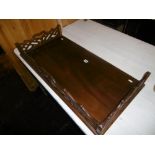 A MAHOGANY FRETTED TRAY