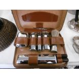 A GENTLEMAN'S GROOMING SET IN LEATHER CASE