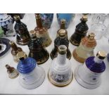 A QUANTITY OF BELLS WHISKY DECANTERS