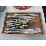 A SET OF SIX SILVER PLATED FISH KNIVES AND FORKS