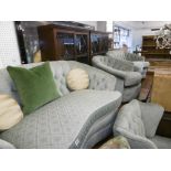 AN UPHOLSTERED FOUR PIECE SUITE