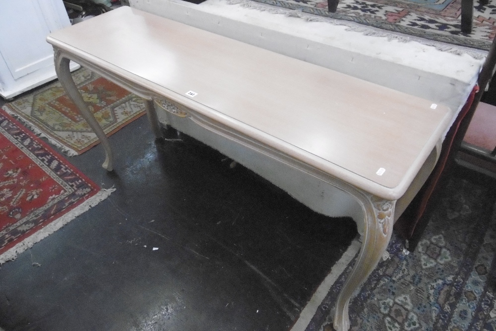 A LIGHT WOOD SERVING TABLE
