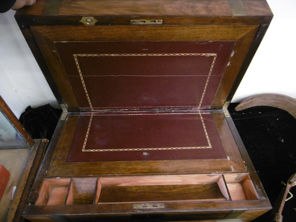 A 19TH CENTURY BRASS BOUND WALNUT WRITING SLOPE