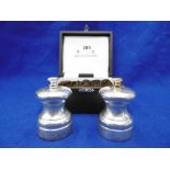 A CASED MAPPIN AND WEBB HALL MARKED SILVER SALT AND PEPPER GRINDERS