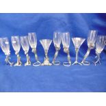 TEN ASSORTED GLASSES ON PEWTER STANDS IN FORM OF ANIMALS