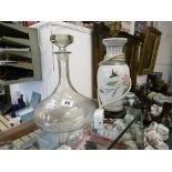 A SHIPS DECANTER AND ORIENTAL TABLE LAMP