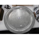 A LARGE ENGRAVED PEWTER PLATTER