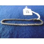 A 9CT WHITE GOLD AND DIAMOND ILLUSION SET TENNIS BRACELET