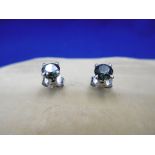 PAIR OF BLUE DIAMOND STUD EARRINGS,