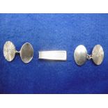 A PAIR OF HM SILVER CUFFLINK'S AND A METAL PENDENT