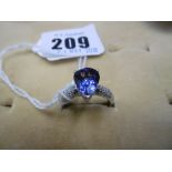 18ct WHITE GOLD TANZANITE PEAR CUT RING WITH DIAMOND SET SHOULDERS APPROX.