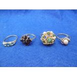 FOUR ASSORTED 9ct GOLD DRESS RINGS