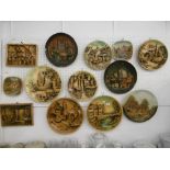 A COLLECTION OF WALL PLAQUES