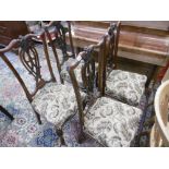 A SET OF FOUR MAHOGANY QUEEN ANN STYLE CHAIRS