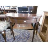 A GEORGIAN SWIVEL TOPPED MAHOGANY CROSS BANDED CARD TABLE