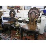 TWO 19TH CENTURY CARVED AND INLAID ITALIAN HALL CHAIRS