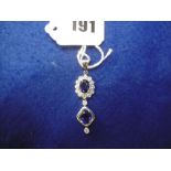 A DIAMOND AND SAPPHIRE DOUBLE DROP PENDENT,