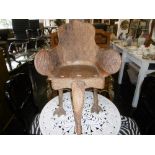 A CARVED EASTERN ANIMAL CHAIR