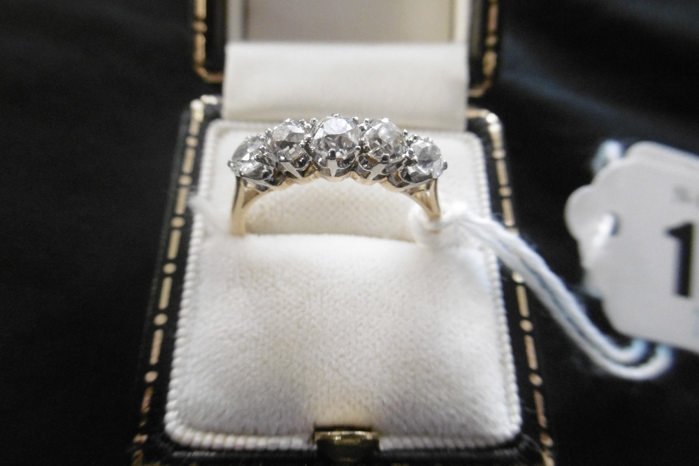 AN 18CT YELLOW GOLD AND PLATINUM FIVE STONE DIAMOND RING