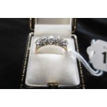 AN 18CT YELLOW GOLD AND PLATINUM FIVE STONE DIAMOND RING