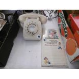 A MABLE LUCY ATTWELL SHOPPING LIST, CIGARETTE CARD ALBUM AND 1960S BAKELITE TELEPHONE,