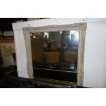 A CREAM PAINTED MIRROR