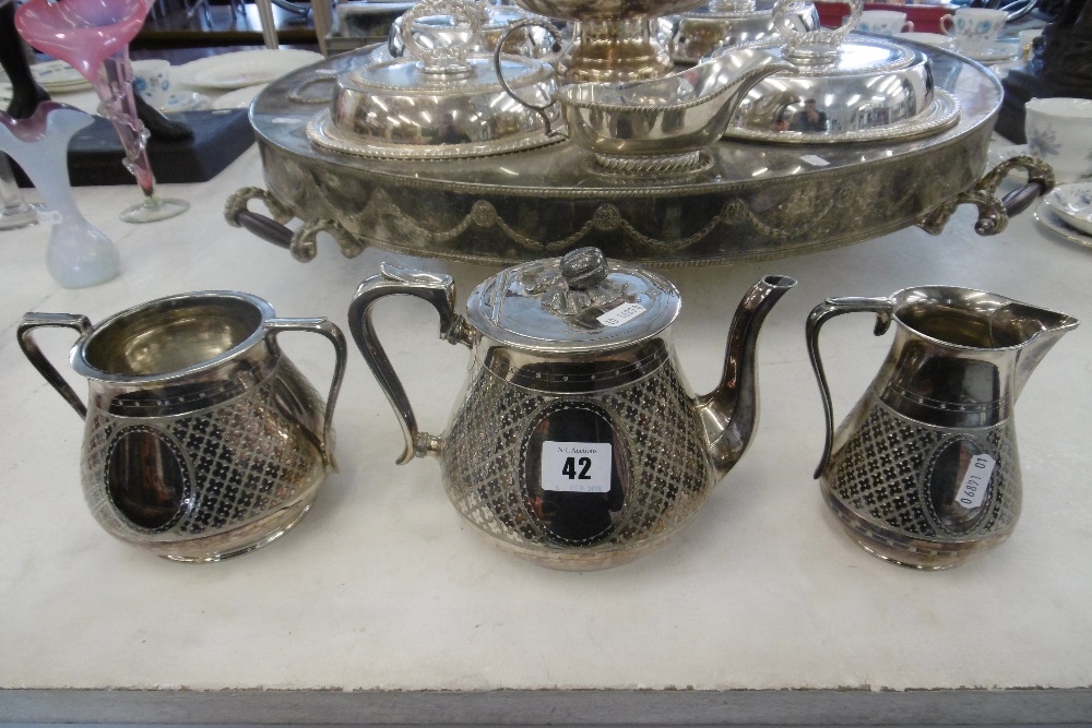 A SILVER PLATED THREE PIECE TEA SET