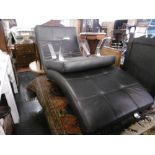 A CONTEMPORARY LEATHER CHAISE LOUNGE AND MATCHING FOOT STOOL