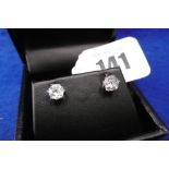 A PAIR OF 18CT WHITE GOLD DIAMOND STUD EARRINGS EACH STONE APPROXIMATELY 70 POINTS