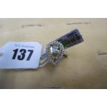 AN 18CT WHITE AND YELLOW GOLD CHAMPAGNE DIAMOND RING WITH WHITE DIAMOND SET HALLO CENTRE PEAR