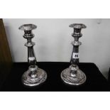 A PAIR OF 19TH CENTURY SILVER PLATED CANDLESTICKS