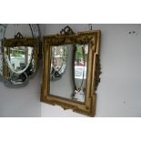 A 19TH CENTURY GILT WOOD AND GESSO WALL MIRROR