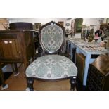 A VICTORIAN MAHOGANY FRAMED NURSING CHAIR A/F