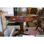 A WILLIAM IV ROSEWOOD FOLD OVER CARD TABLE ON CARVED FEET