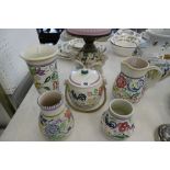 FIVE PIECES OF HAND PAINTED POOLE POTTERY, THREE VASES,