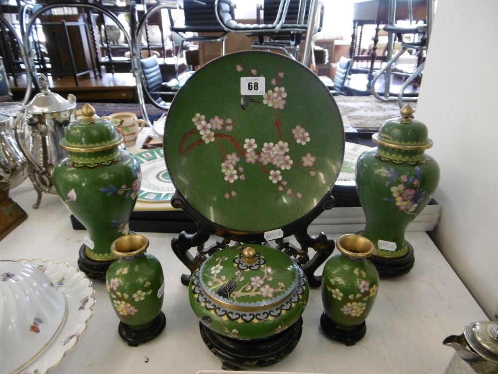 SIX PIECES OF ORIENTAL CLOISONNE SET WITH STANDS, LIDDED VASES,