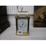 A MAPPIN AND WEBB BRASS CASED CARRIAGE CLOCK