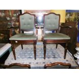 A REGENCY STYLE DINING TABLE AND SIX CHAIRS