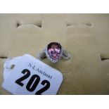 A PLATINUM TOURMALINE AND DIAMOND SET RING SIZE H