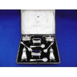 A HM SILVER BOXED CRUET SET