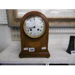 AN INLAID MAHOGANY CLOCK,