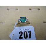 AN 18CT GOLD EMERALD AND DIAMOND RING SIZE L AND HALF