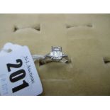 A PLATINUM AND DIAMOND SET RING CENTRE STONE 1.