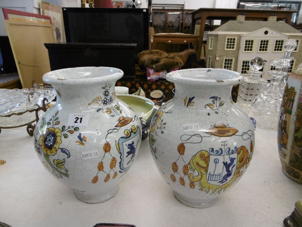 A PAIR OF CONTINENTAL VASES A/F